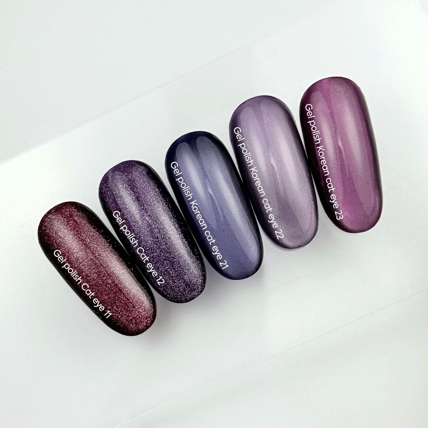 NAILSOFTHEDAY Korean Cat Eye 23 — esmalte efecto ojo de gato en tono rosa-violeta. 6 ml.